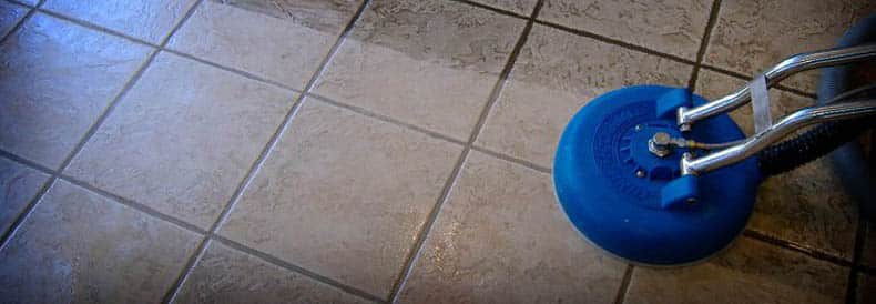 This image shows a man polishing a floor.