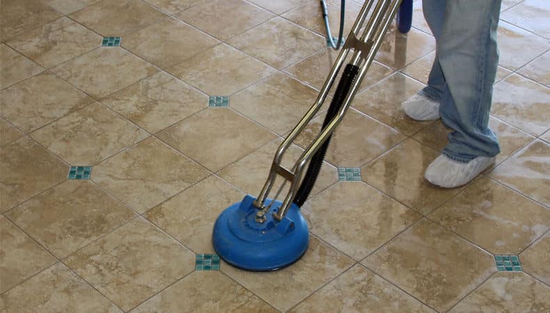 This image shows a man polishing a floor.