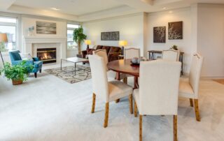 This image shows a dining and living room carpet that is very clean.